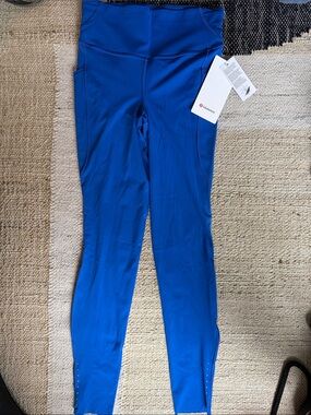 Lululemon Athletic Leggings in Bright Blue size: 6